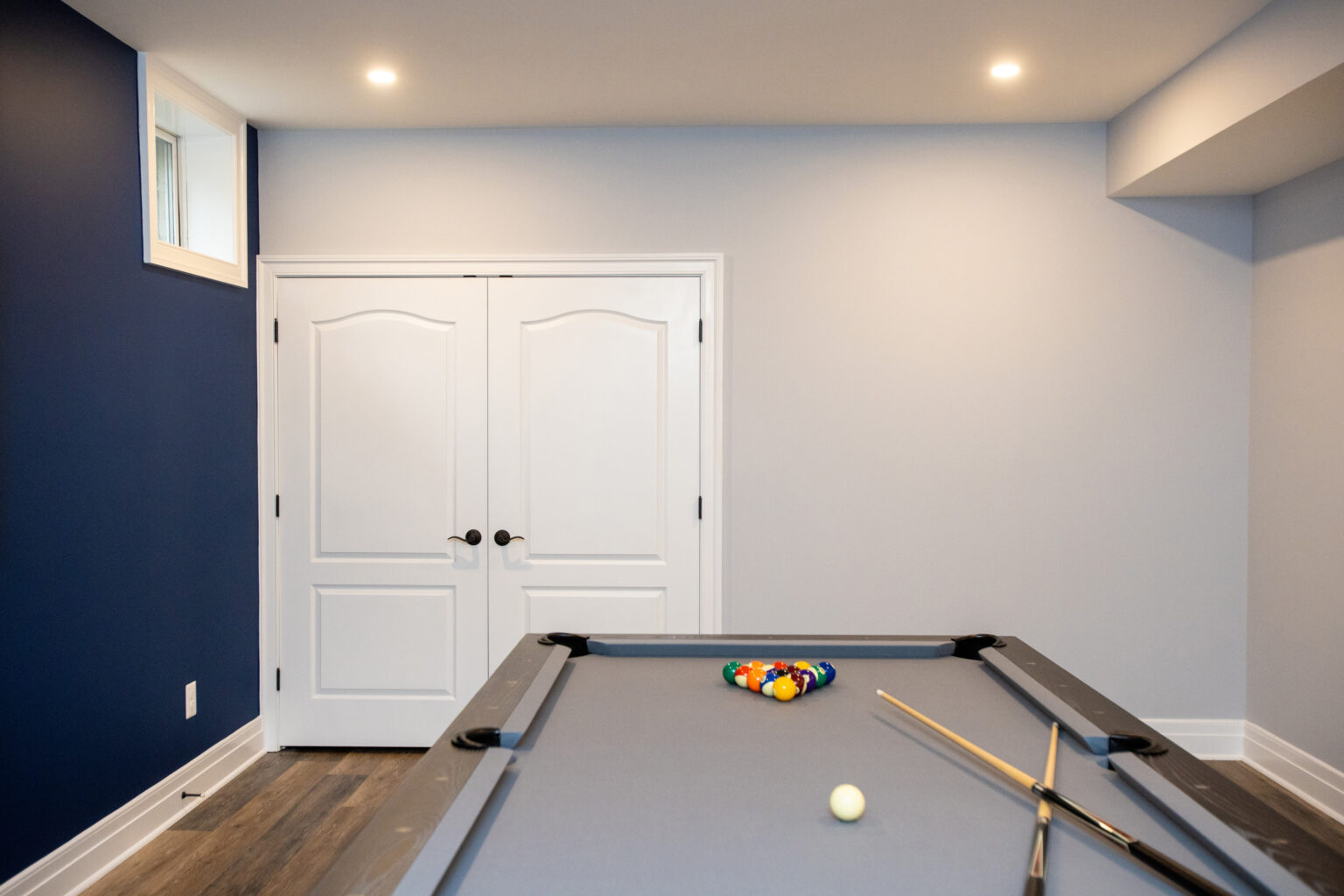 Pool table area in this finished basement in Herndon