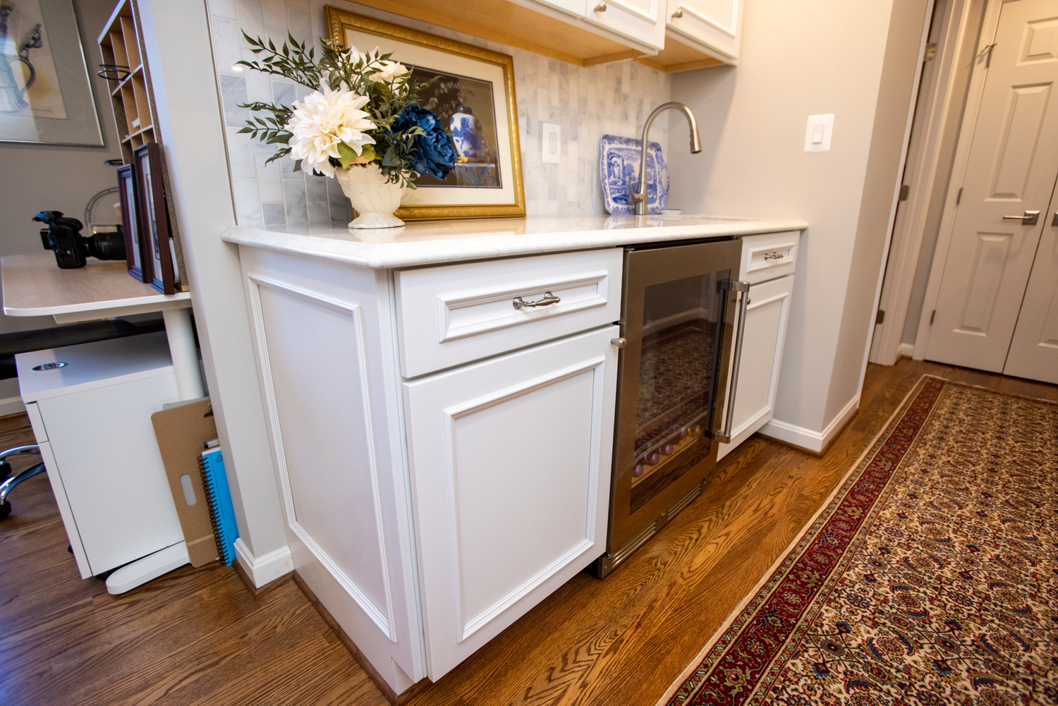 Image by Lesnick Photo master suite beverage center with refrigerator and small sink.