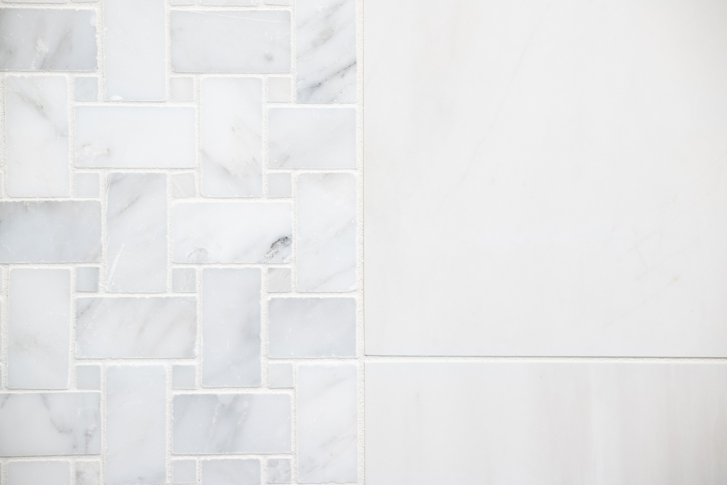 Image by Lesnick Photo Detailed tile against large-format tile for this shower in great falls, virginia.