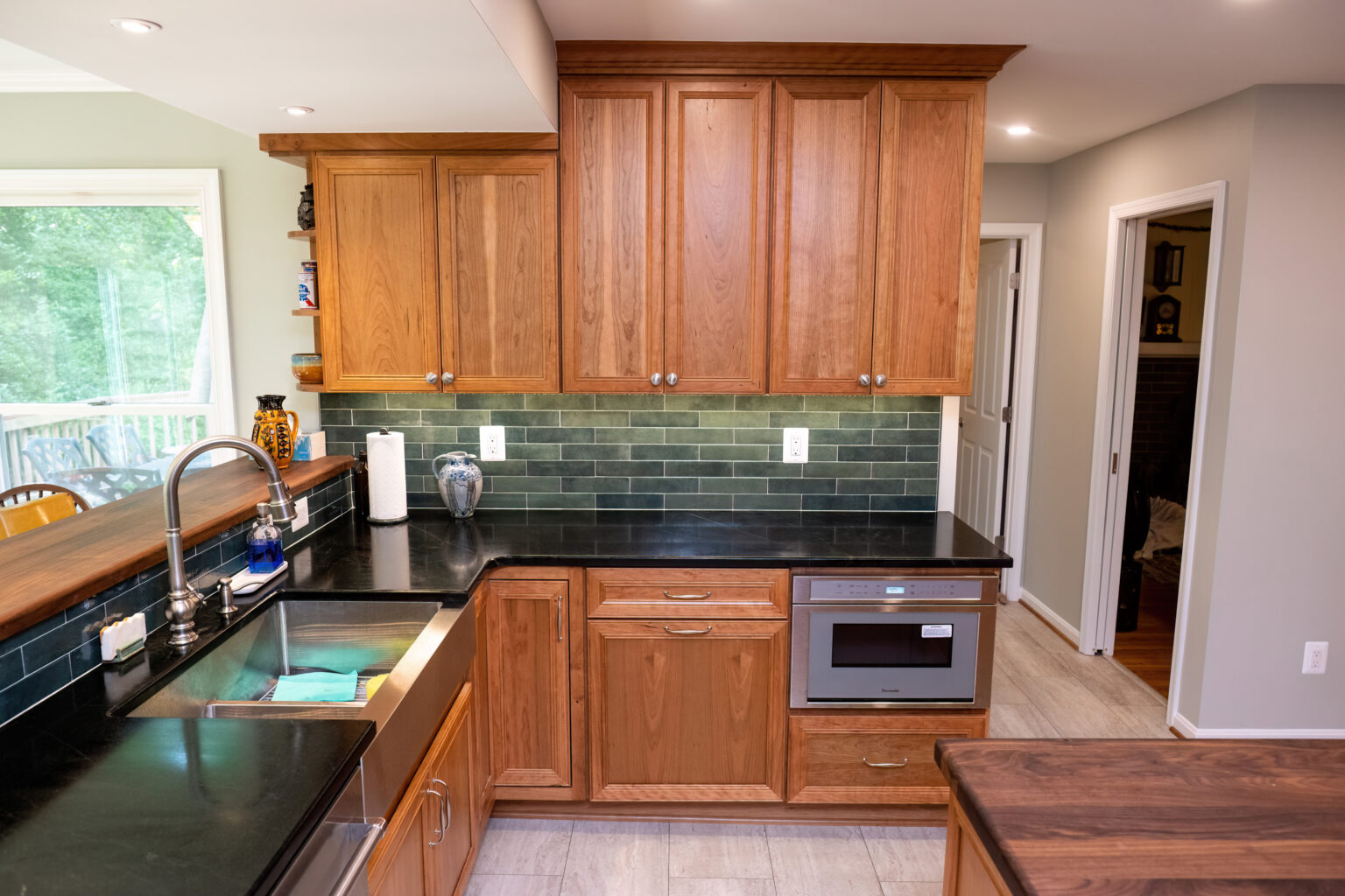 Image by Lesnick Photo Cherry cabinets, soapstone countertop and microwave drawer in this newly remodeled kitchen in Reston.