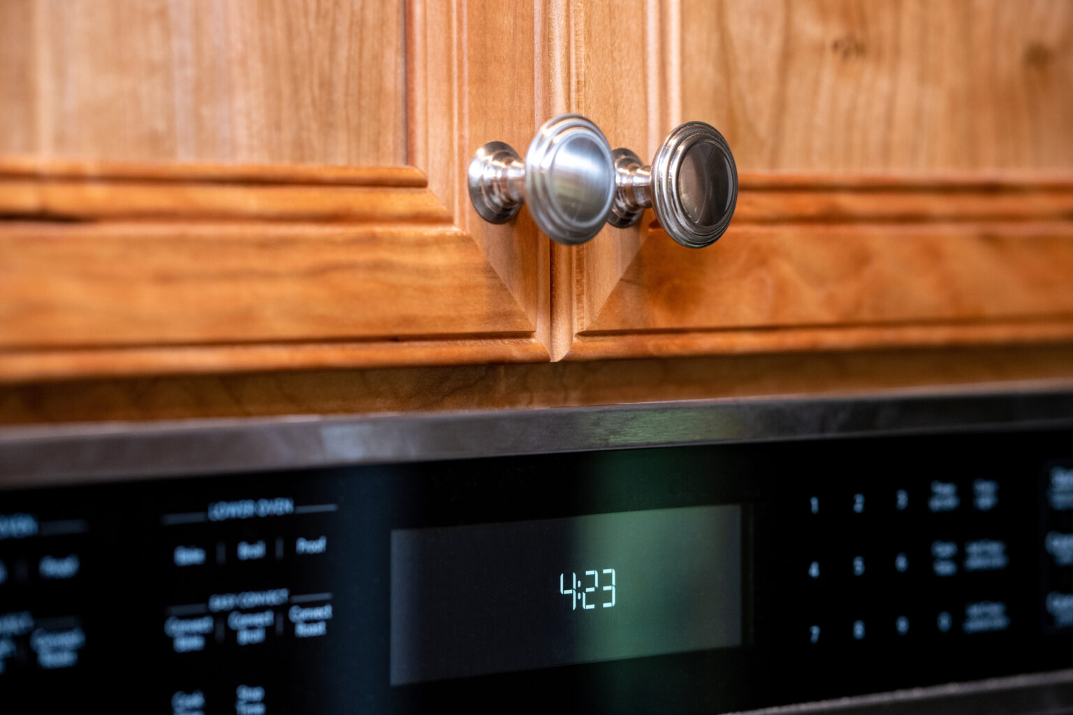 Image by Lesnick Photo close up of the brushed nickel cabinet knobs